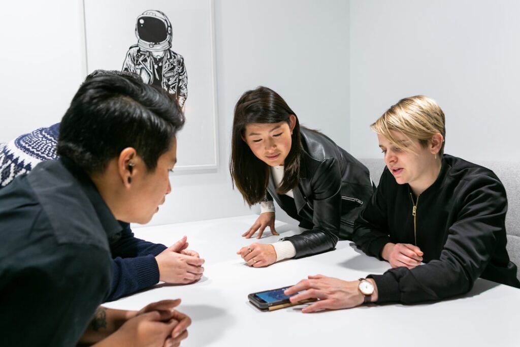 Photo A developer reviewing detailed blueprints with Garris Direct staff